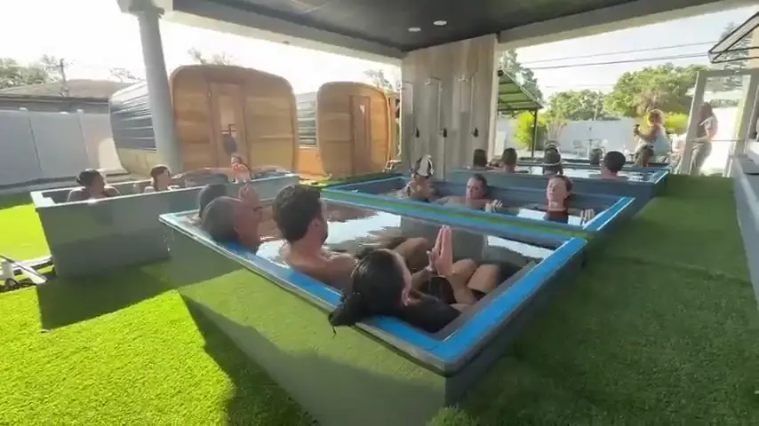 A group sitting together in an ice bath